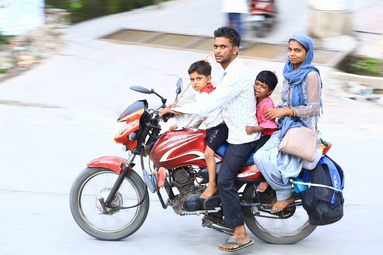 Family travelling by motorcycle