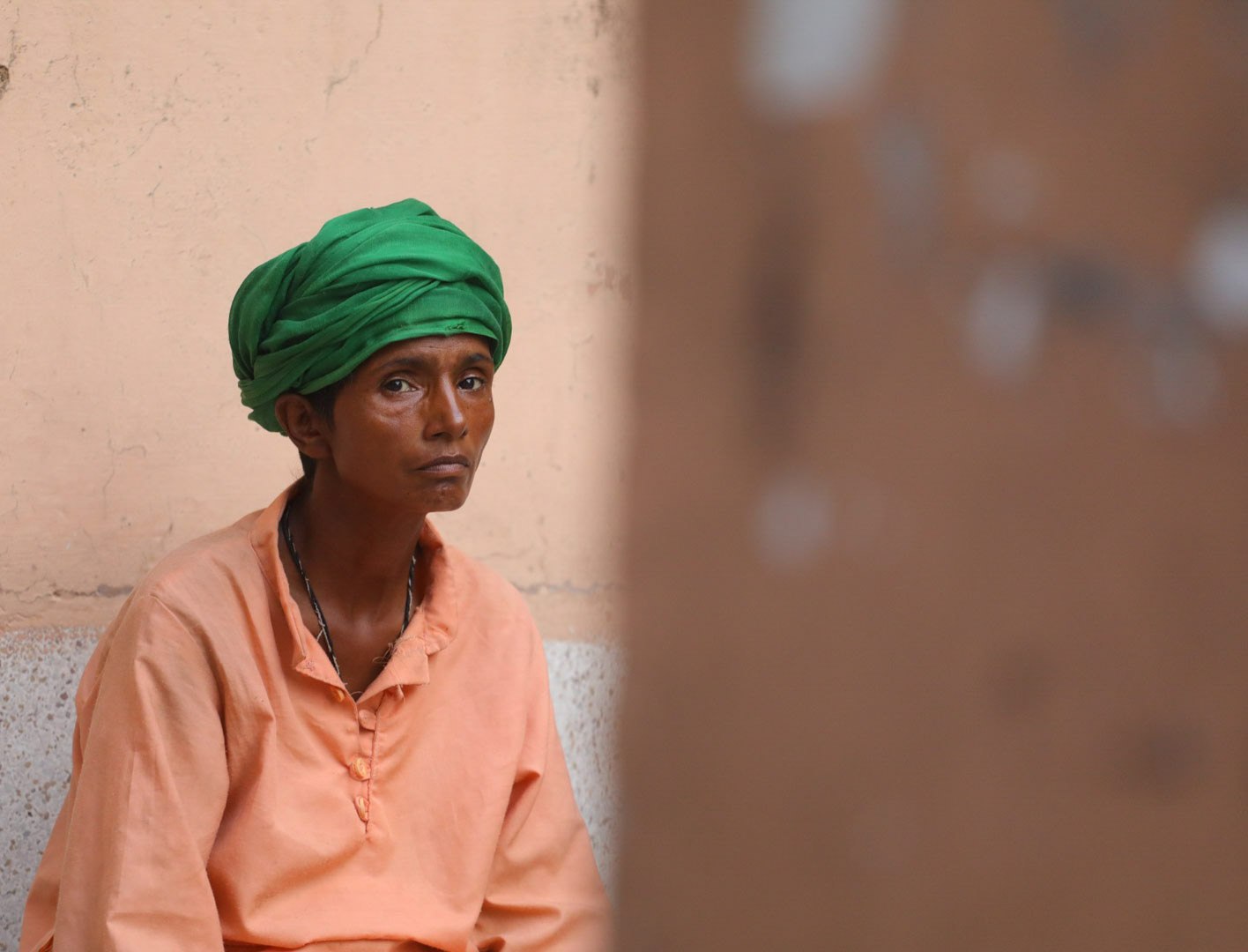 Portrait of a person in a green turban