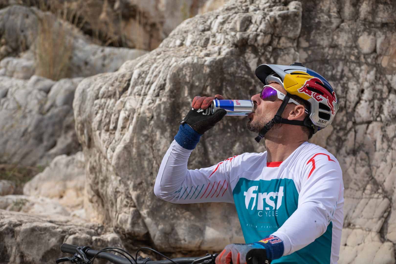 Cyclist taking a drink after a ride